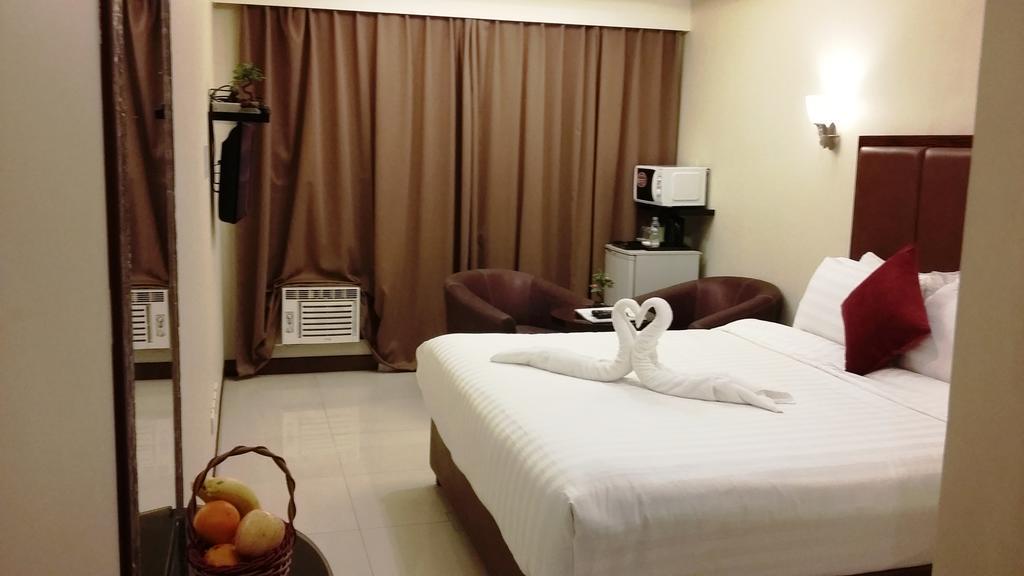 JMM Apartment Suites Manille Extérieur photo