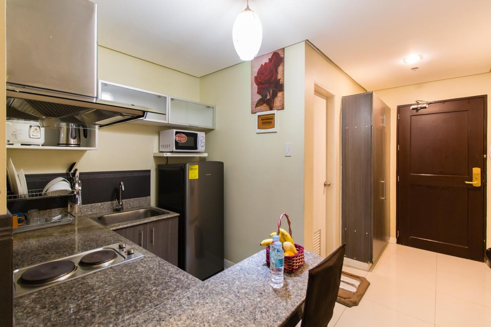 JMM Apartment Suites Manille Extérieur photo