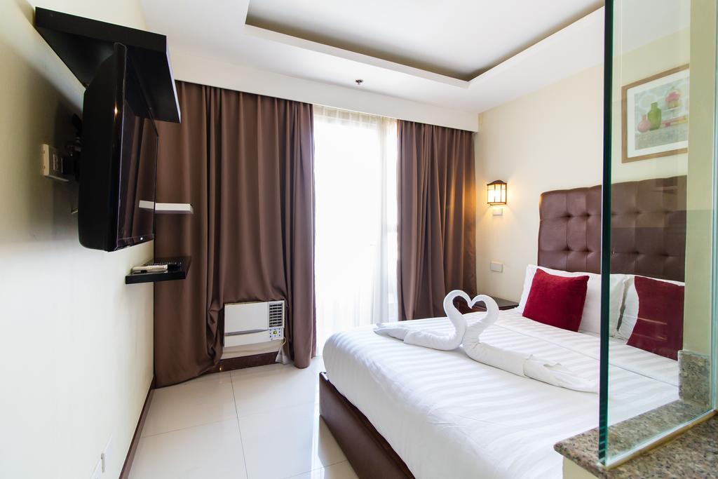 JMM Apartment Suites Manille Extérieur photo