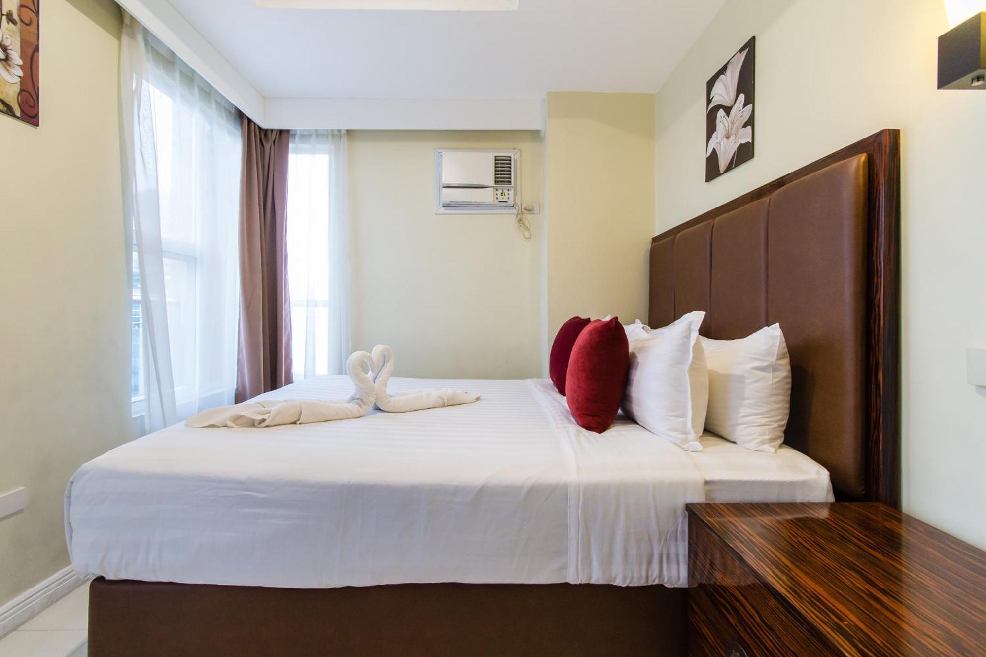 JMM Apartment Suites Manille Extérieur photo