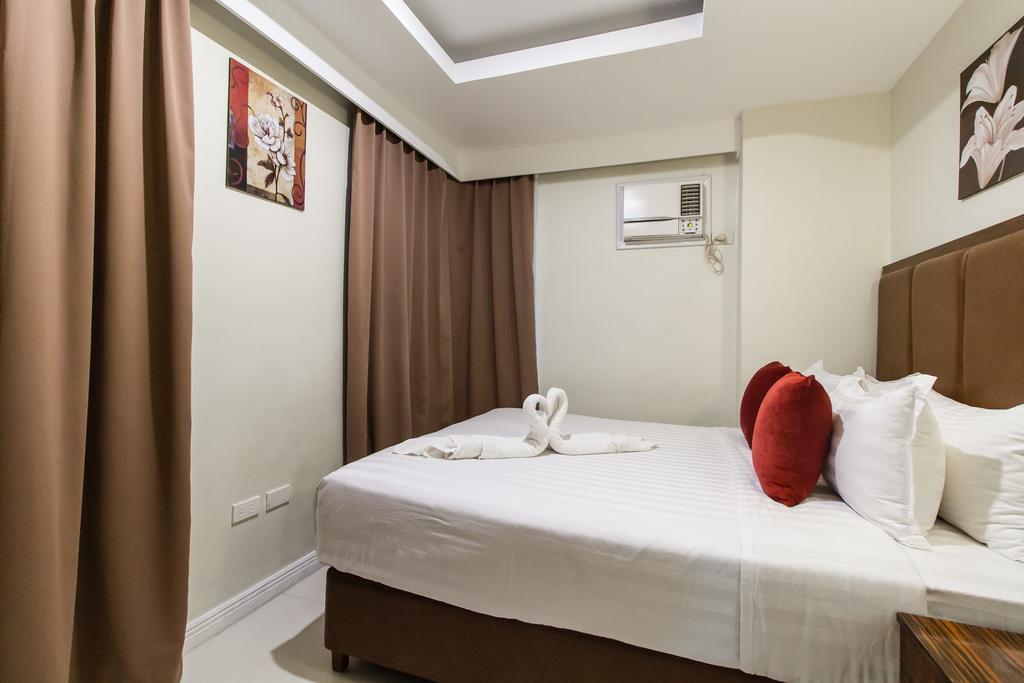 JMM Apartment Suites Manille Extérieur photo