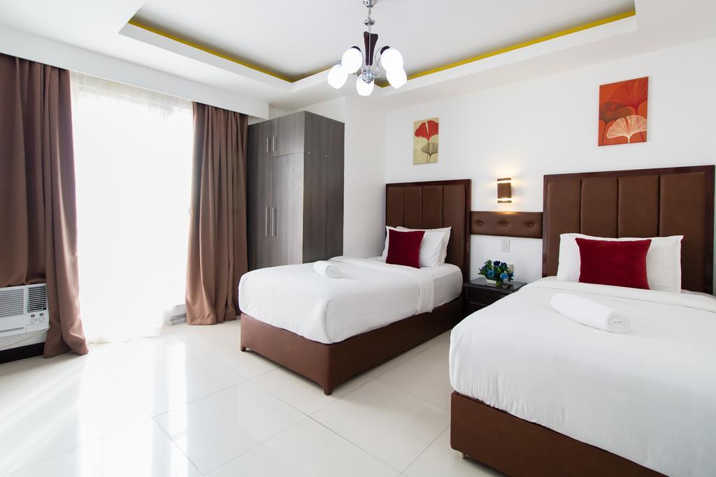 JMM Apartment Suites Manille Extérieur photo