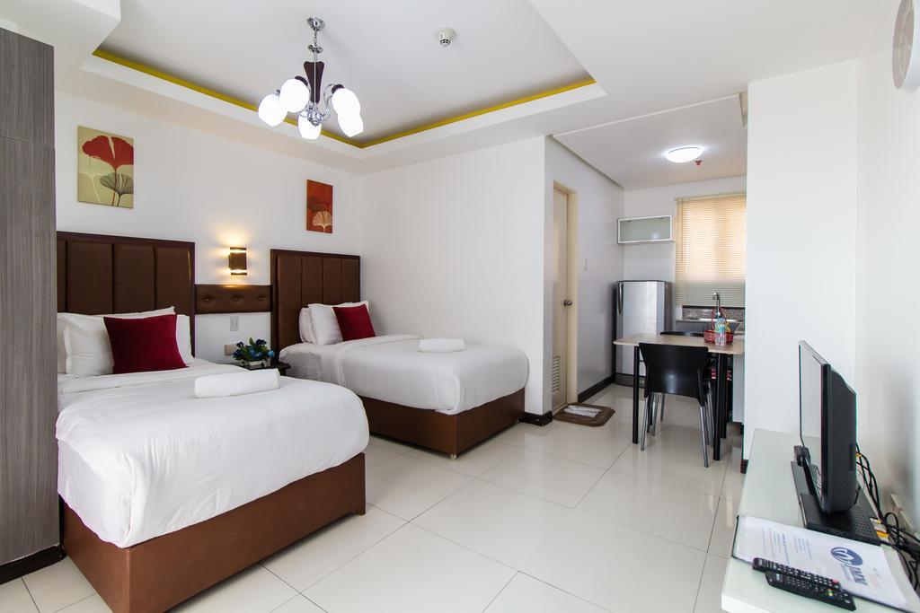 JMM Apartment Suites Manille Extérieur photo
